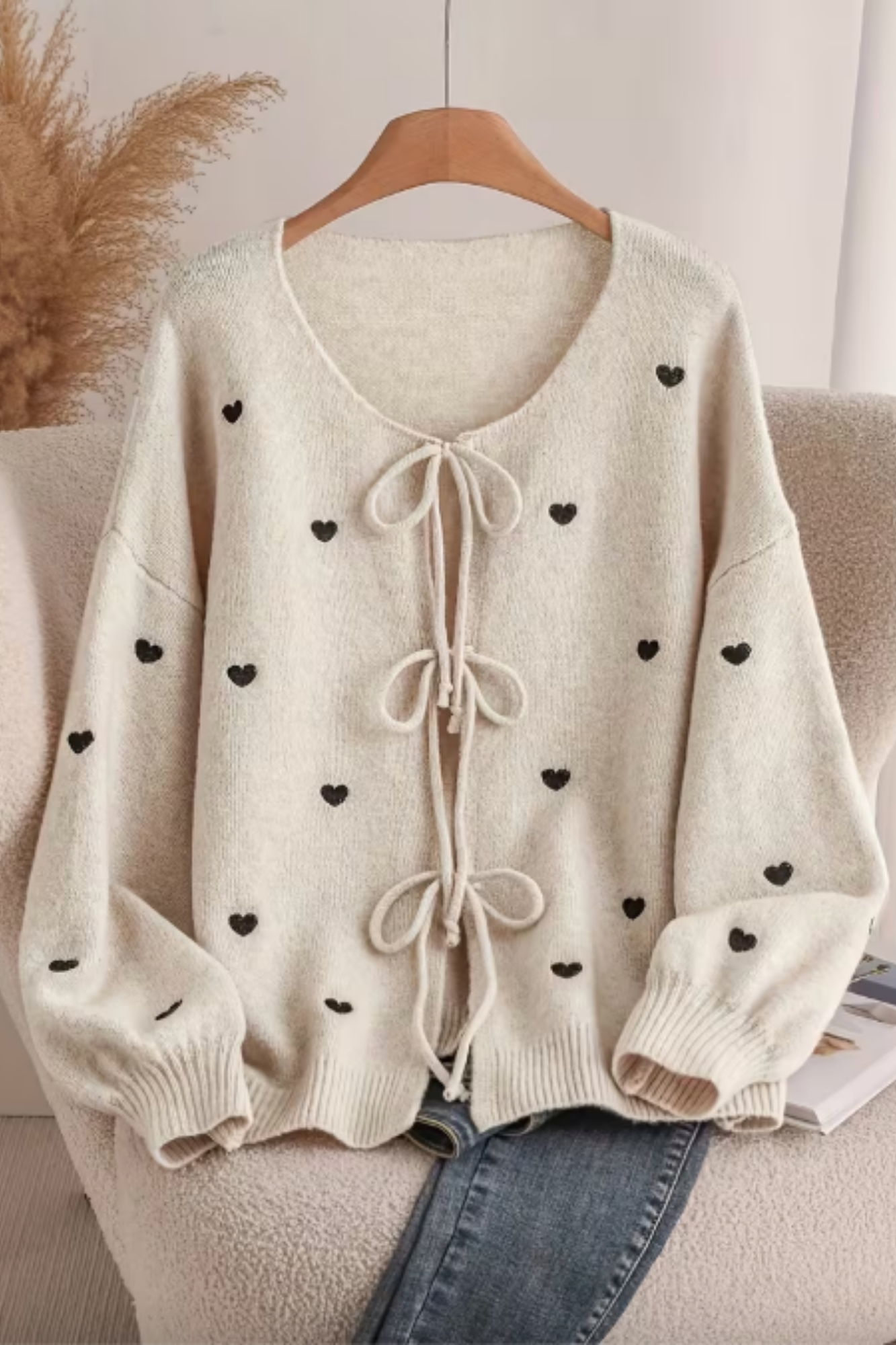 Beige Cardigan with Black Hearts