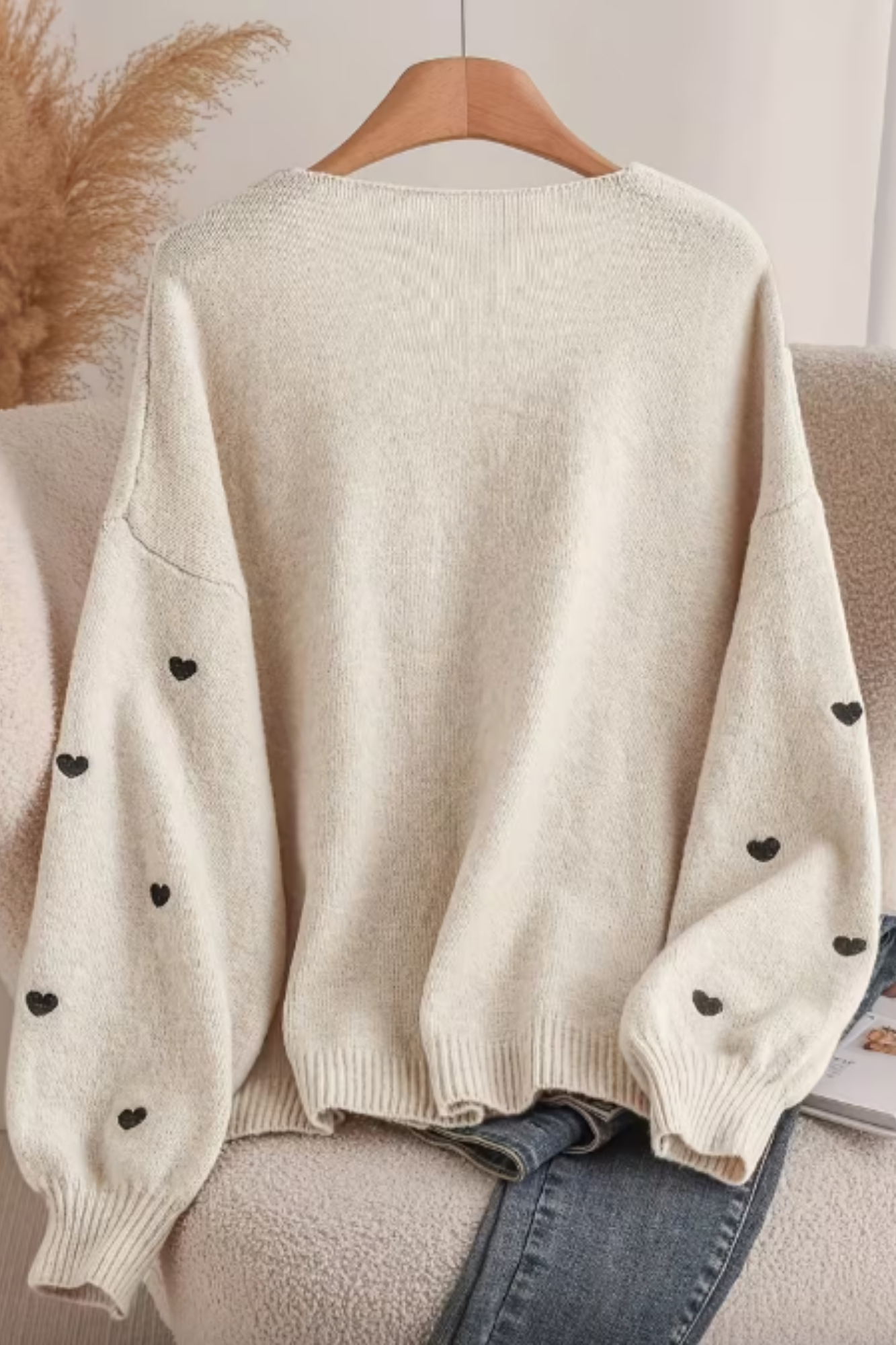 Beige Cardigan with Black Hearts